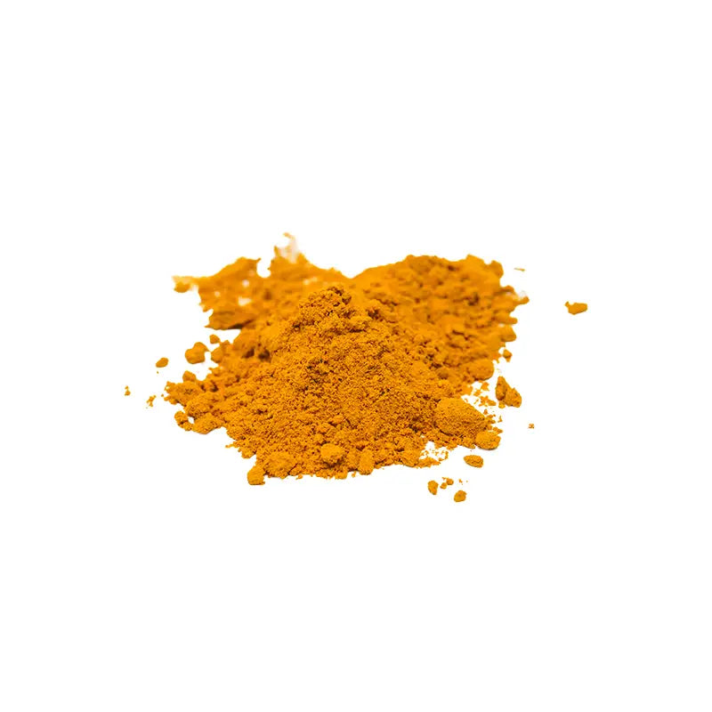 Turmeric powder on a white background