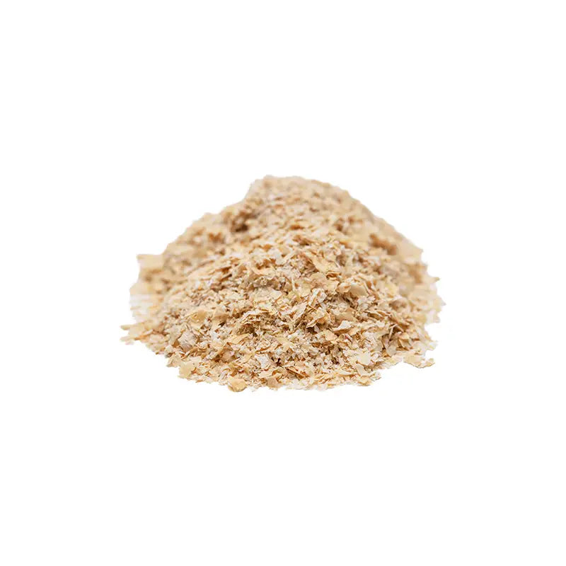 Heap of brown powder on a white background